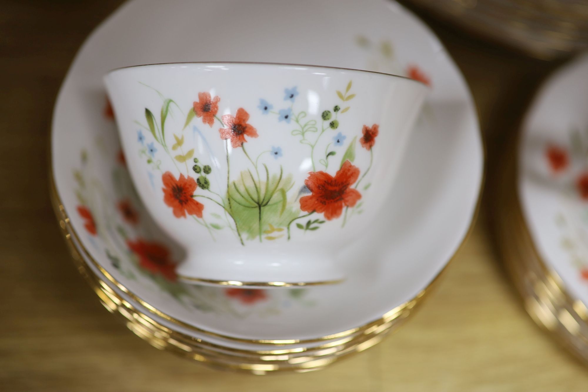 A Colclough floral decorated fifty nine piece part tea service